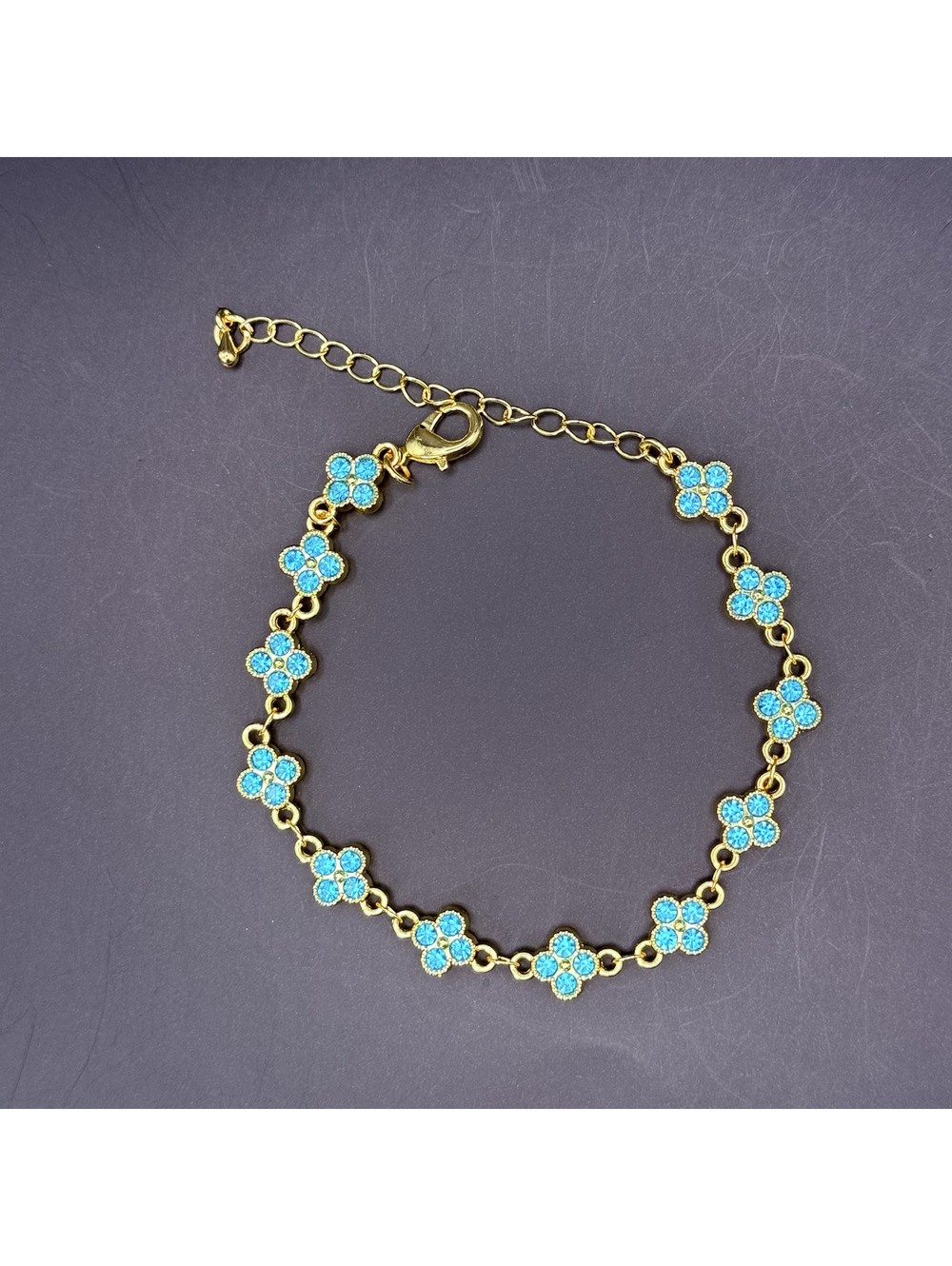 candy+clover aqua crystal clover gold tone bracelet